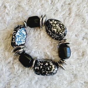New in package adjustable lightweight bead bracelet